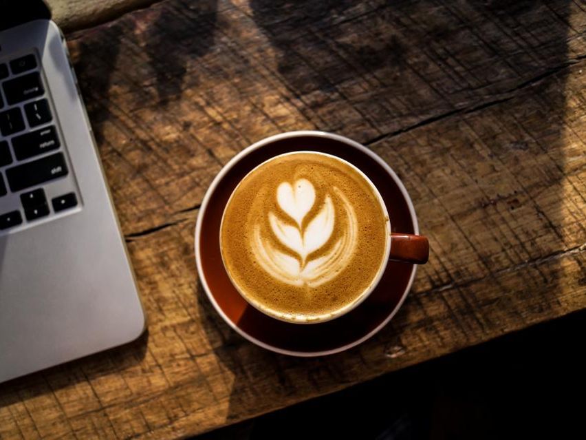 Latte art on a wooden table